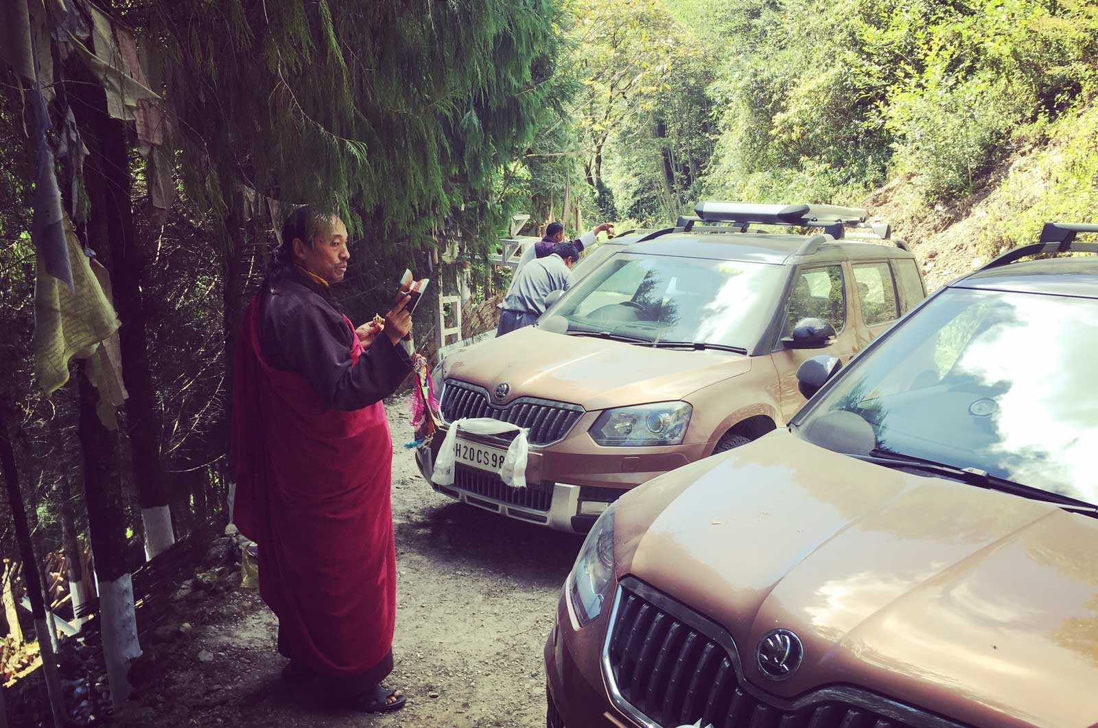 Monk with cars