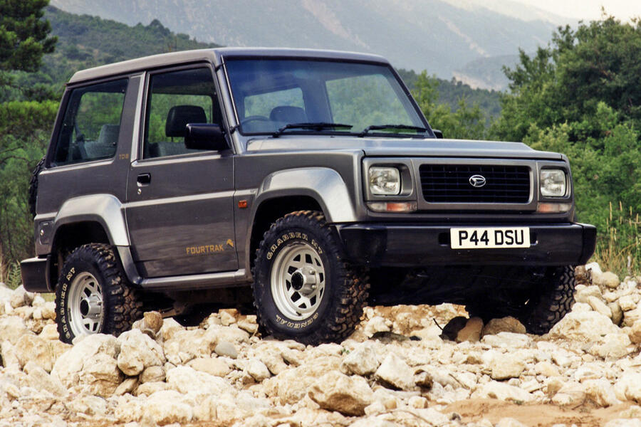 3 Daihatsu fourtrak stationary front