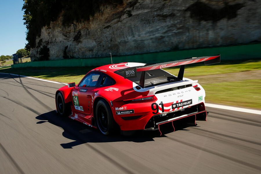 97 Porsche 911 rsr 19 drive hero rear