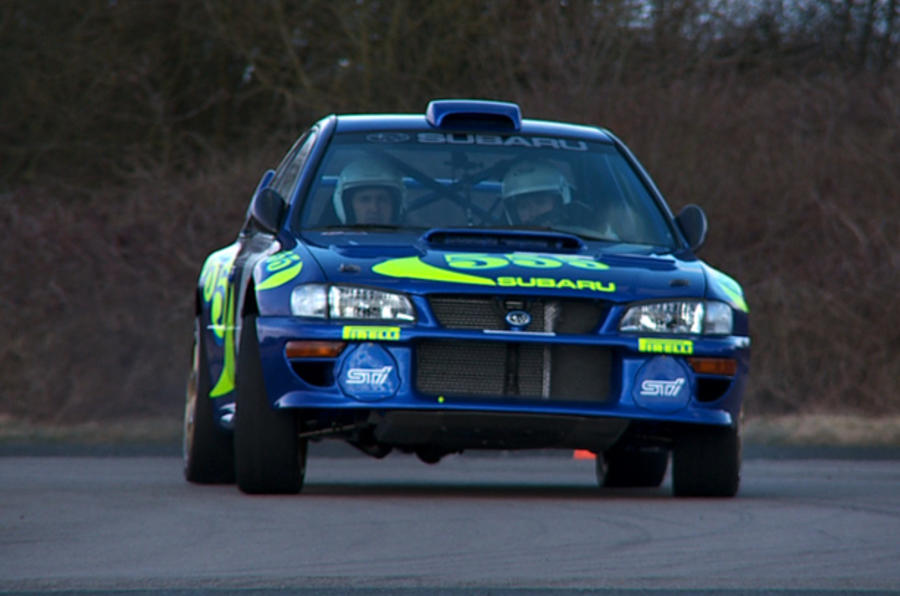 Three Subaru rally cars driven